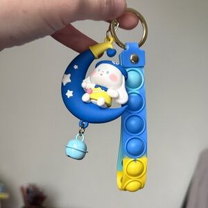 Cinnamon Roll on Moon keychain (Yellow and Blue)